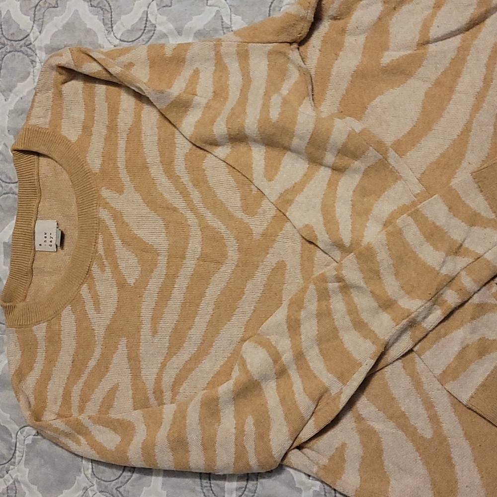 A New Day sweater